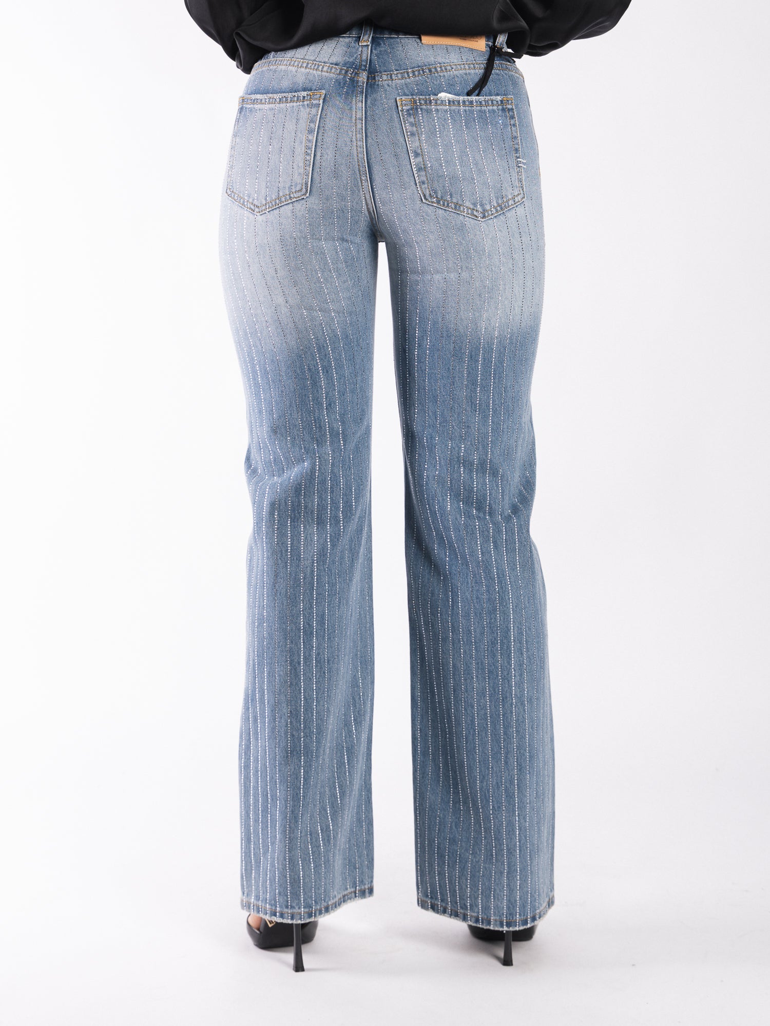 Jeans in denim con swarovski VICOLO